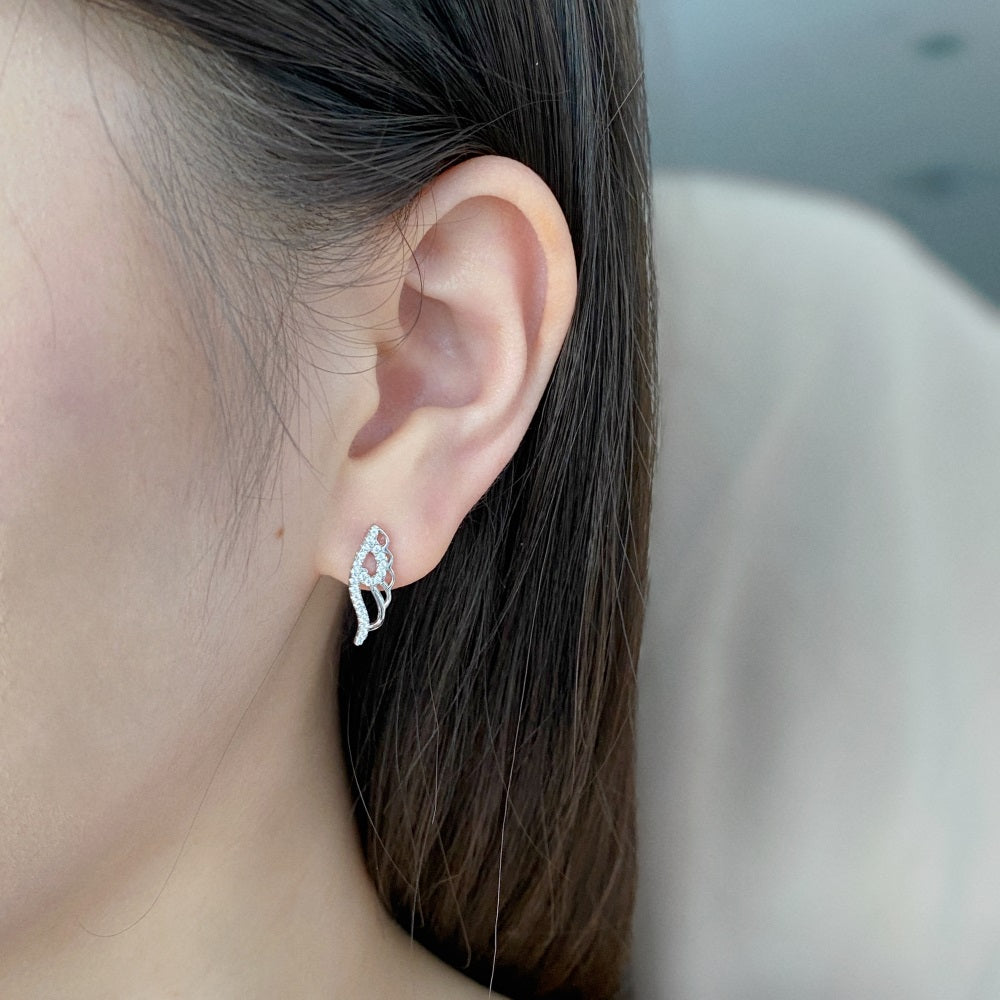 An image of one wearing Angel Wings earrings