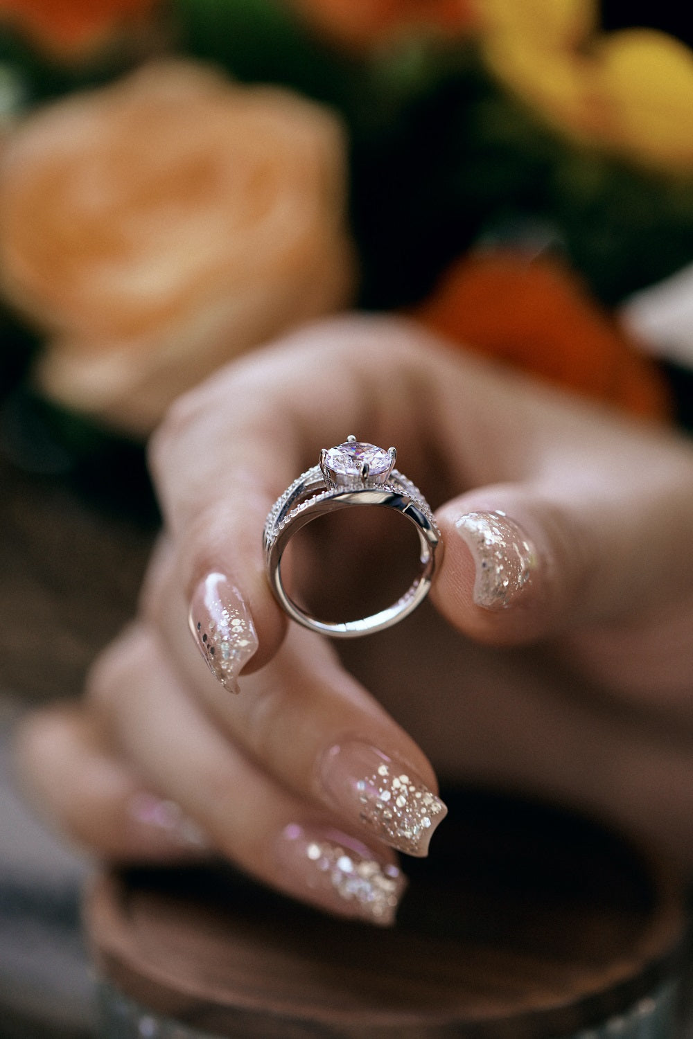 Image of someone holding a Diana ring