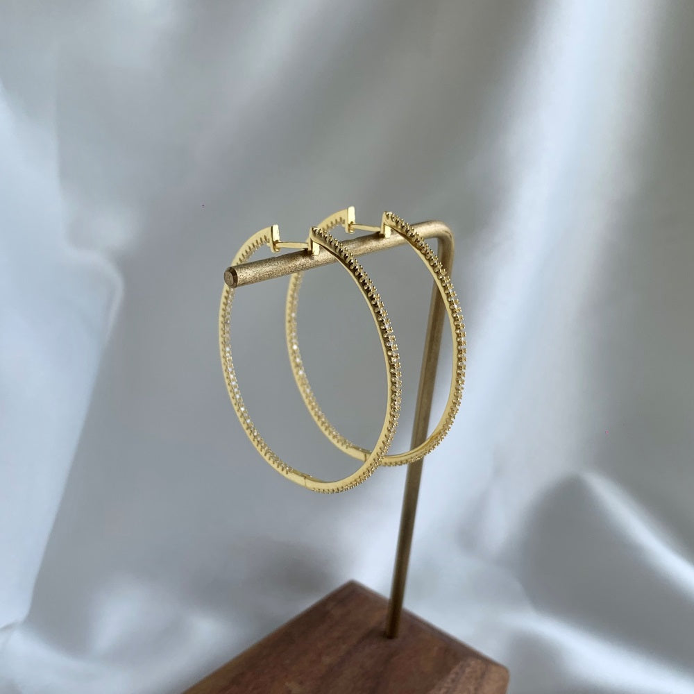 An image showing a display of mia hoop earrings