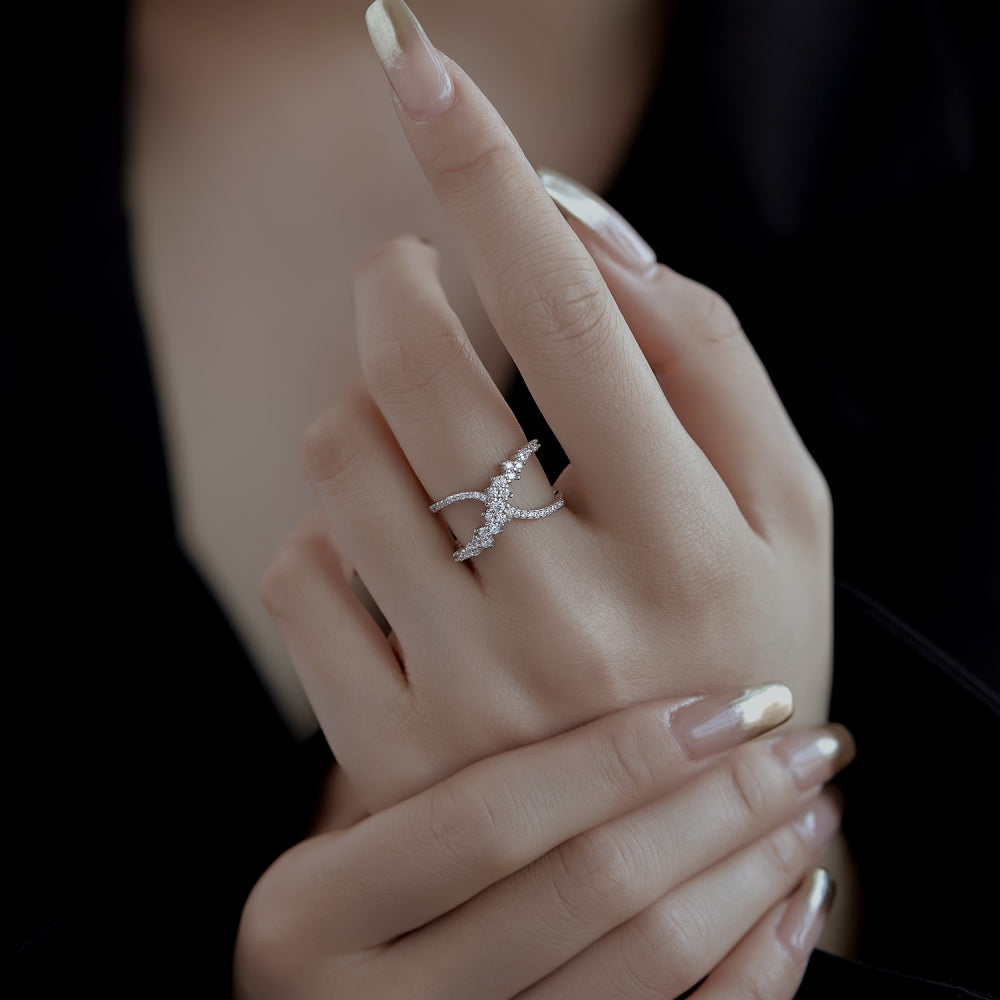 A close up image of a woman wearing Mia ring