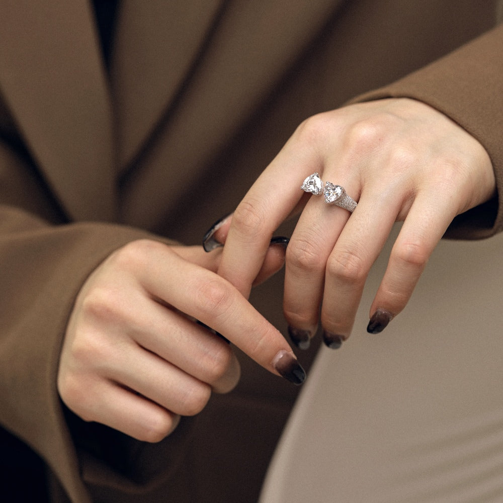 Woman wearing Myra ring on middle finger