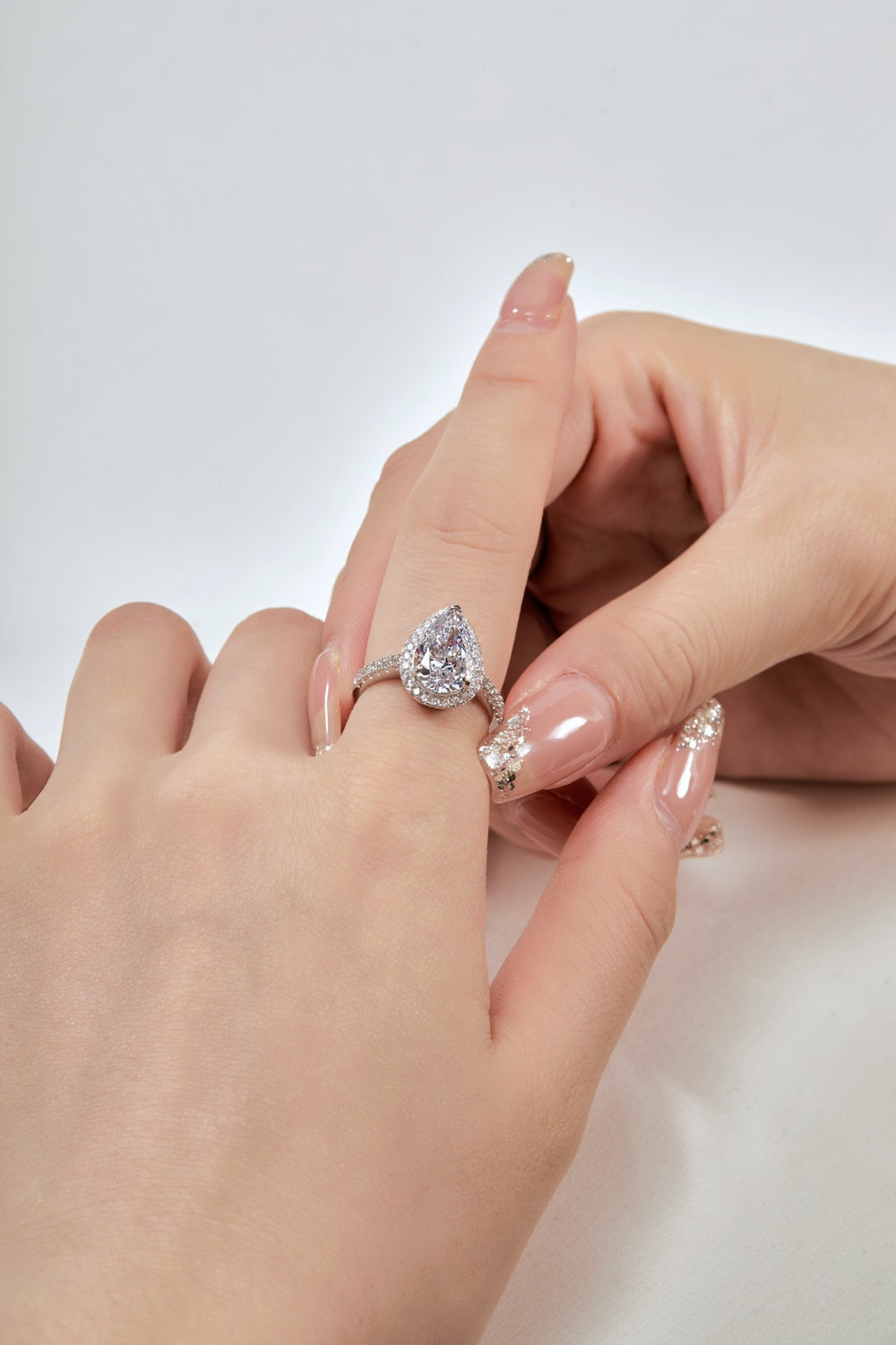 Image of someone wearing a Princess ring on their finger